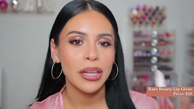 @juicyjas reviewing Rare Beauty Lip Gloss at 09:25 in a YouTube Shorts video