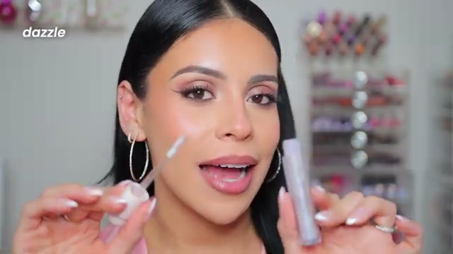 @juicyjas reviewing Rare Beauty Lip Gloss at 11:36 in a YouTube Shorts video
