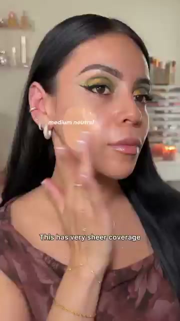 @juicyjas reviewing Revolution Beauty Super Dewey Skin Tint at 00:39 in a YouTube Shorts video