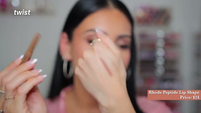 @juicyjas reviewing Rhode Peptide Lip Shape at 00:32 in a YouTube Shorts video