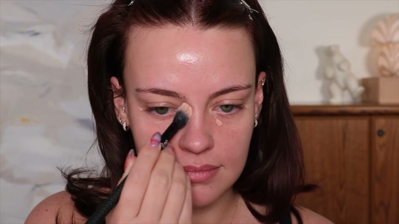 @juliaadamsmua reviewing Kosas Revealer Extra Bright Color Correctors at 02:36 in a YouTube Shorts video