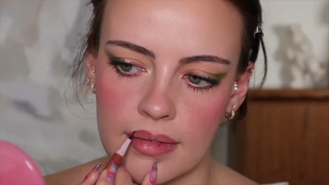 @juliaadamsmua reviewing NYX PROFESSIONAL MAKEUP Lingerie Lip Liner Stain at 17:20 in a YouTube Shorts video