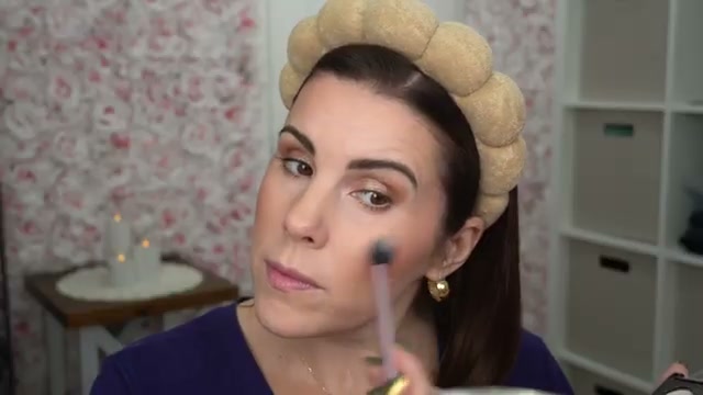 @juliedawnbeauty reviewing Hard Candy Look on Lock Makeup Setting Spray at 09:22 in a YouTube Shorts video