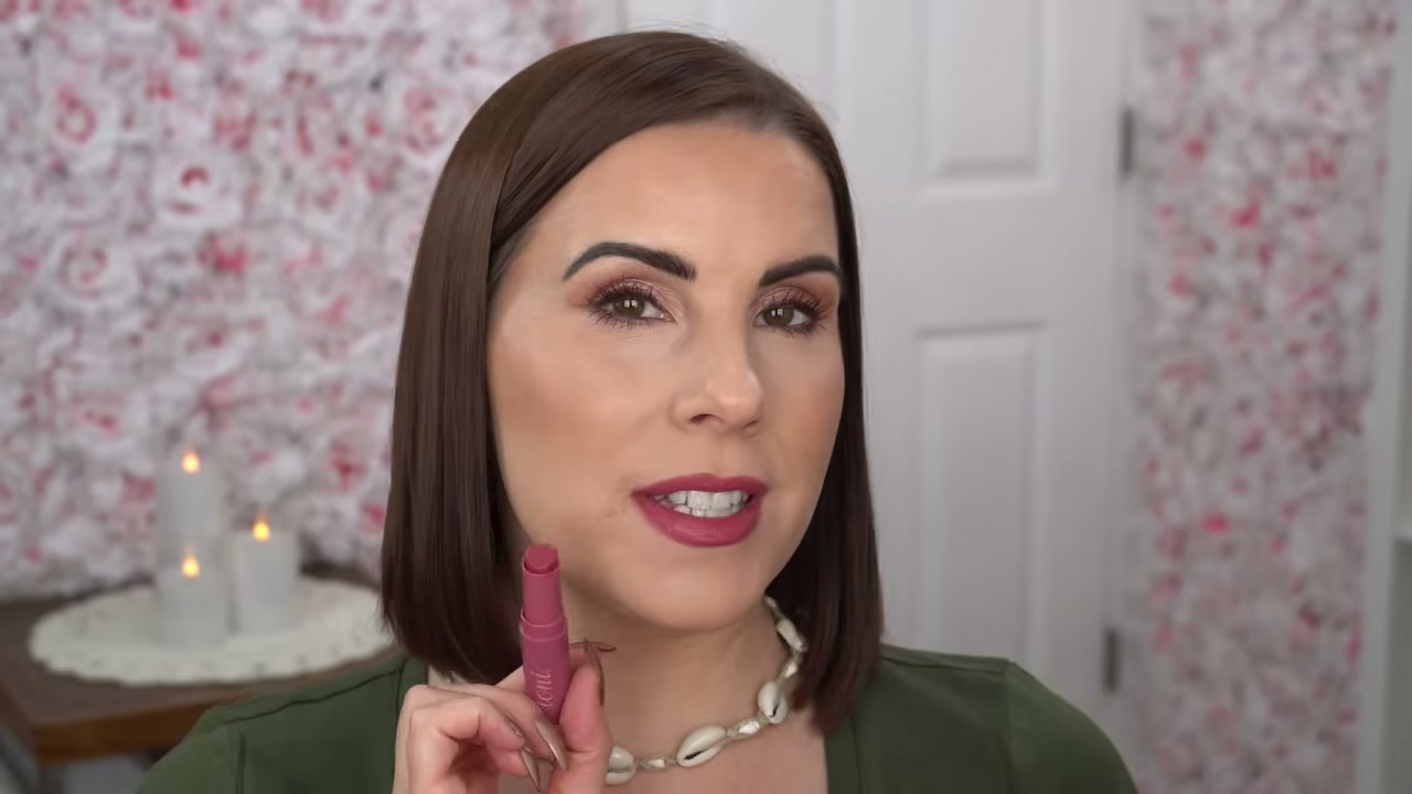 @juliedawnbeauty reviewing IONI Cosmetics Shea Butter Lipstick at 04:52 in a YouTube Shorts video