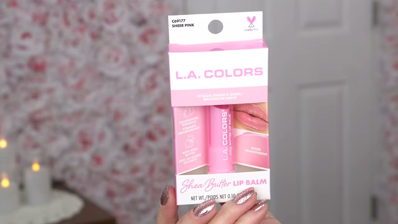 @juliedawnbeauty reviewing L.A. Colors Stay Jelly Sheer Butter Balm at 39:12 in a YouTube Shorts video