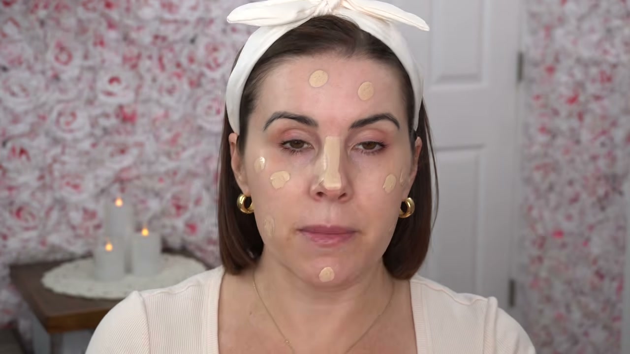 @juliedawnbeauty reviewing L.A. Colors Truly Matte Foundation at 00:28 in a YouTube Shorts video