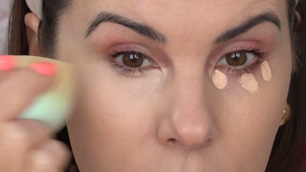 @juliedawnbeauty reviewing L.A. Colors Ultimate Cover Concealer at 01:36 in a YouTube Shorts video