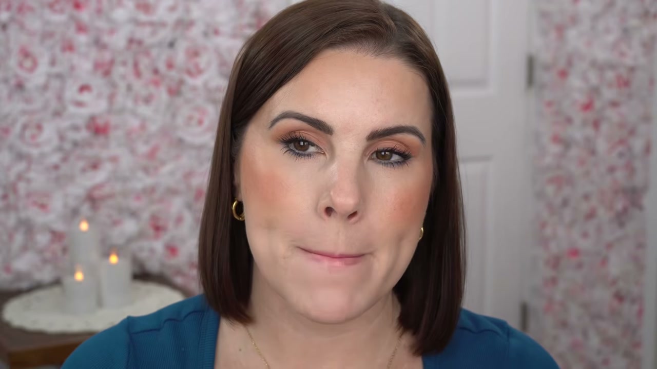 @juliedawnbeauty reviewing Morphe Lip Lock Glossy Lipstick at 23:46 in a YouTube Shorts video