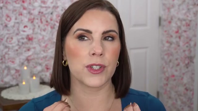 @juliedawnbeauty reviewing Morphe Lip Lock Glossy Lipstick at 25:36 in a YouTube Shorts video