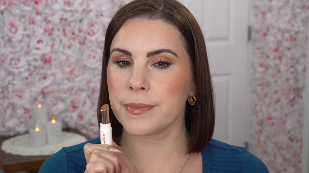@juliedawnbeauty reviewing Morphe Lip Lock Glossy Lipstick at 27:12 in a YouTube Shorts video
