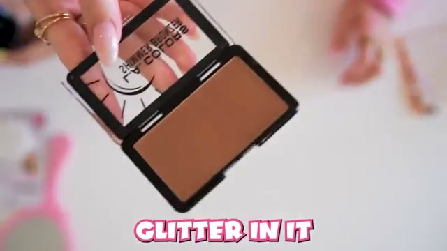 @justkass reviewing L.A. Colors Shimmer Bronzer at 30:02 in a YouTube Shorts video