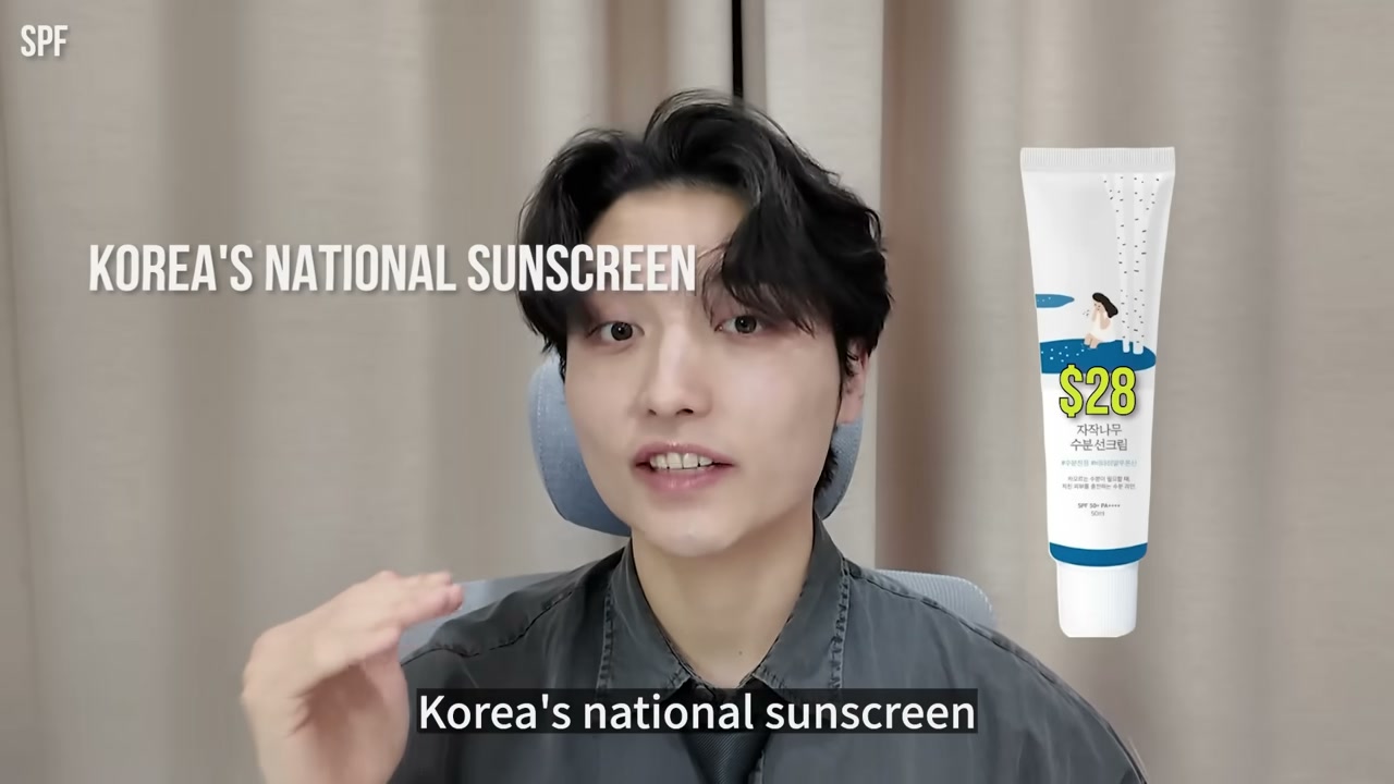 @k-bestie_jin reviewing Round Lab Birch Juice Moisturizing Sunscreen at 11:16 in a YouTube Shorts video