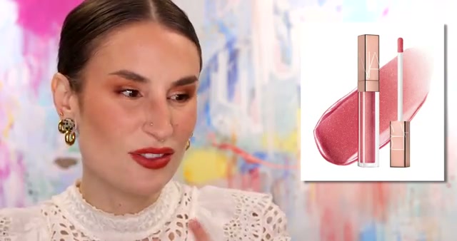 @kackie reviewing NARS Afterglow Lip Shine at 06:06 in a YouTube Shorts video