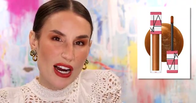 @kackie reviewing NARS Hot Escape Afterglow Lip Oil at 12:55 in a YouTube Shorts video