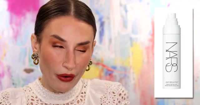 @kackie reviewing NARS Light Reflecting Makeup Setting Mist at 13:11 in a YouTube Shorts video