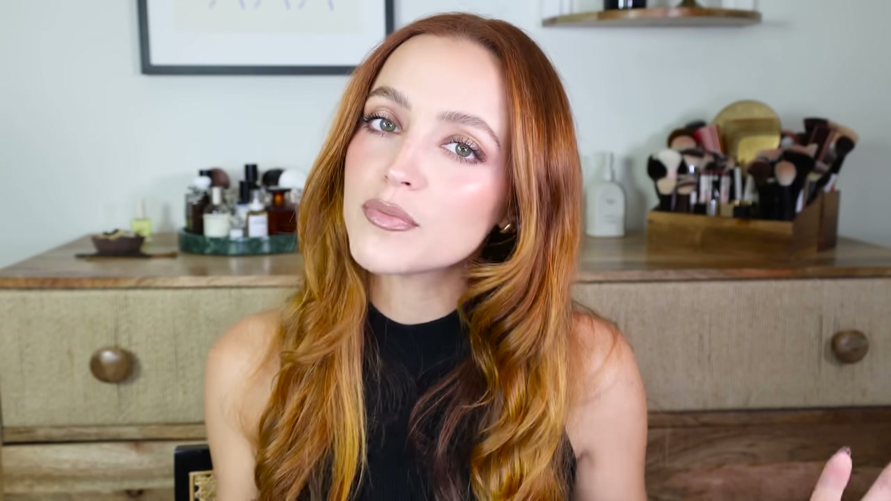 @kathleenlights reviewing Charlotte Tilbury Beauty Highlighter Wand at 03:39 in a YouTube Shorts video
