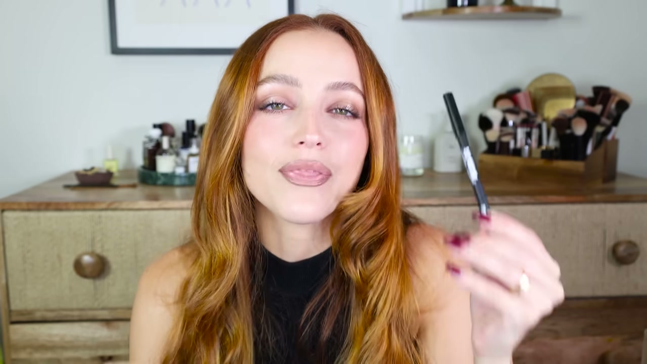 @kathleenlights reviewing Half Magic Glitter Puck Pressed Fairy Dust Eyes, Face + Body at 09:00 in a YouTube Shorts video