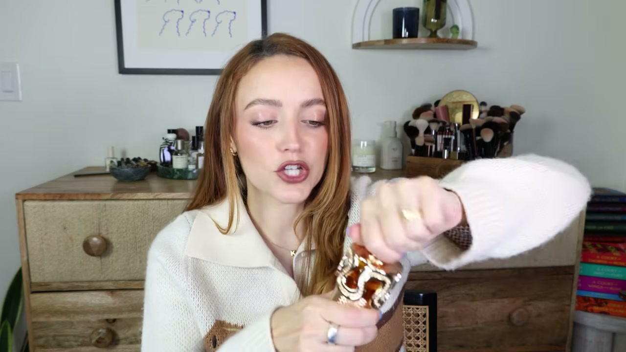 @kathleenlights reviewing Lattafa Mita Fragrance Oil at 06:44 in a YouTube Shorts video