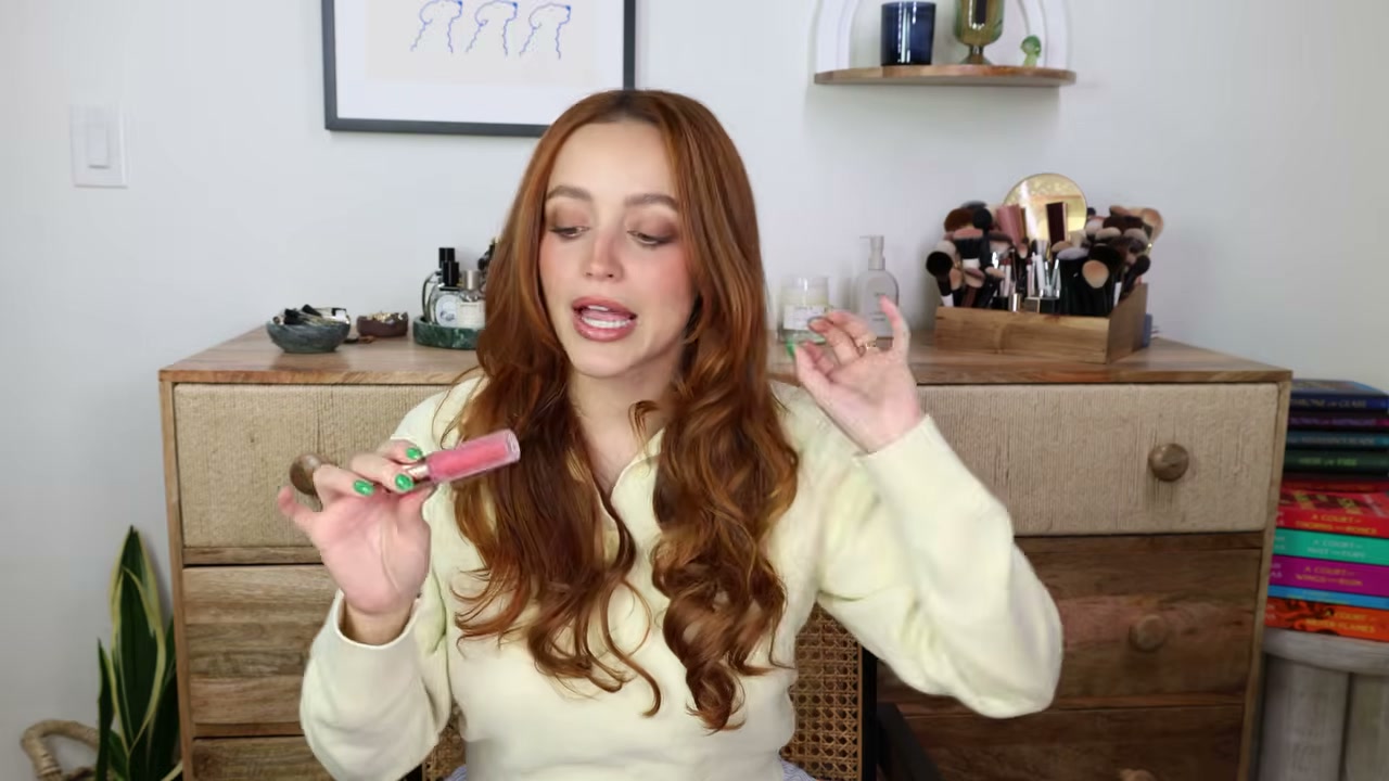 @kathleenlights reviewing Lawless Forget the Filler Lip Gloss at 13:13 in a YouTube Shorts video