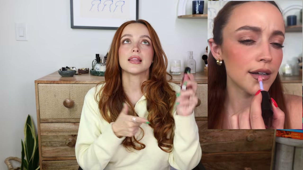 @kathleenlights reviewing Saie Glossybounce High-Shine Hydrating Lip Gloss Oil at 12:38 in a YouTube Shorts video