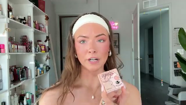 @kayla.ryan1 reviewing Benefit Cosmetics Cookie Powder Highlighter at 12:36 in a YouTube Shorts video
