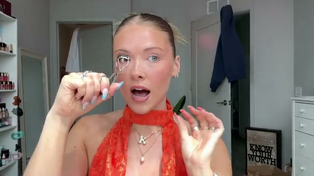 @kayla.ryan1 reviewing e.l.f. Cosmetics Pro Curler at 04:09 in a YouTube Shorts video
