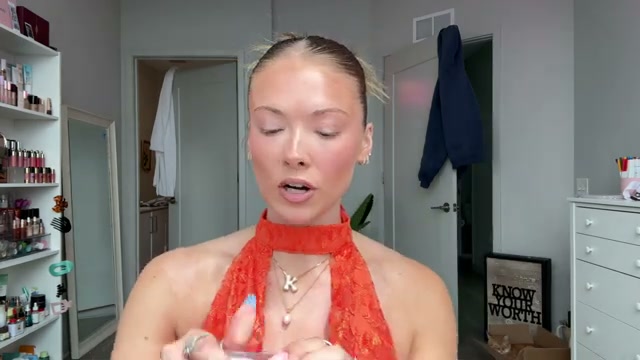 @kayla.ryan1 reviewing Ka Beauty Juicy Glass Lip Oil at 03:54 in a YouTube Shorts video