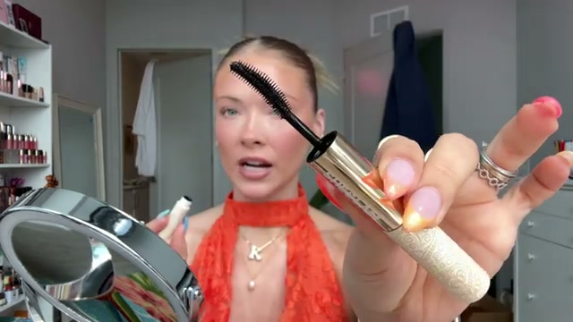 @kayla.ryan1 reviewing SHEGLAM 24 Karat Gold Mascara at 04:20 in a YouTube Shorts video