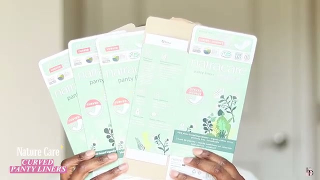 @kdcreatiive reviewing Natracare Mini Panty Liners at 19:44 in a YouTube Shorts video