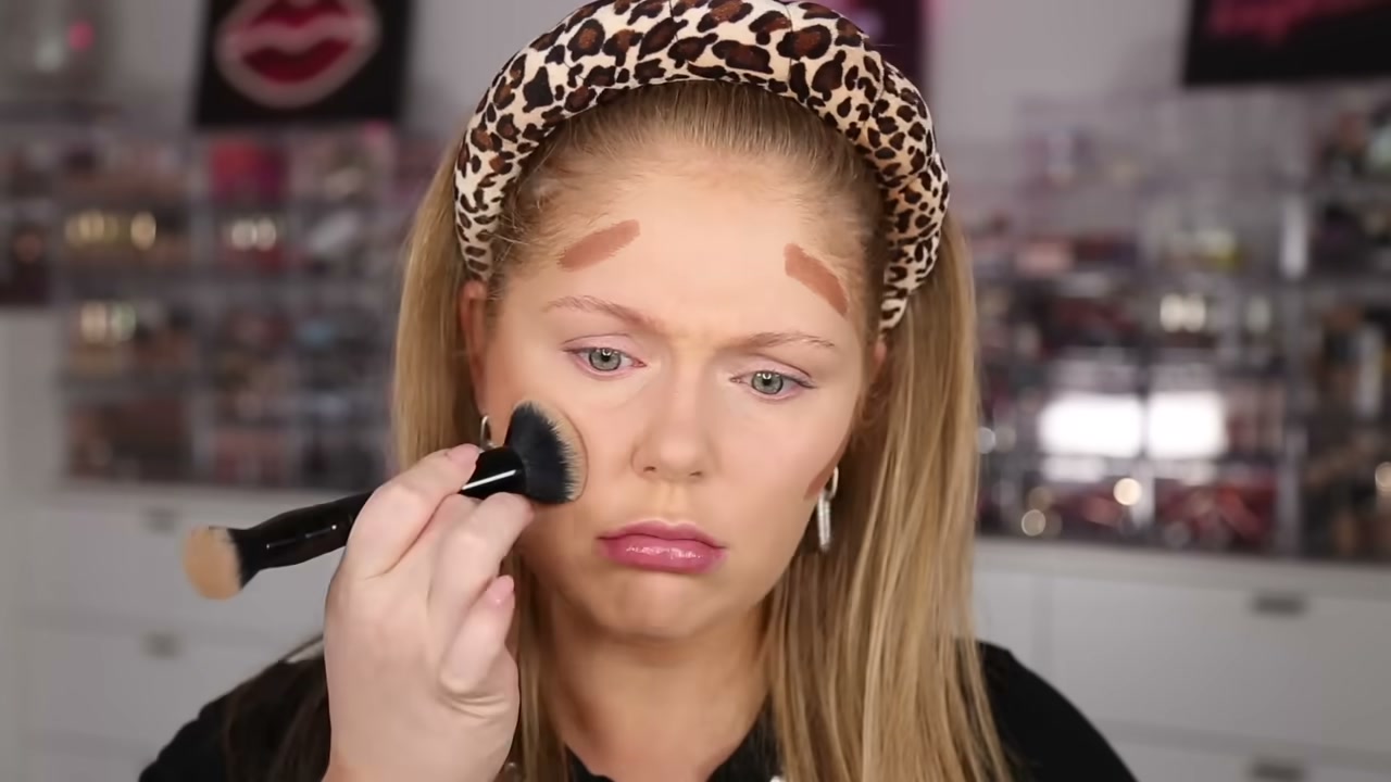 @kellystrack reviewing Essence Foundation Stick at 03:47 in a YouTube Shorts video