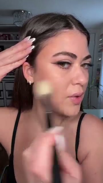 @kendallalfred reviewing CoverGirl Baked Luminous Bronzer at 00:51 in a YouTube Shorts video