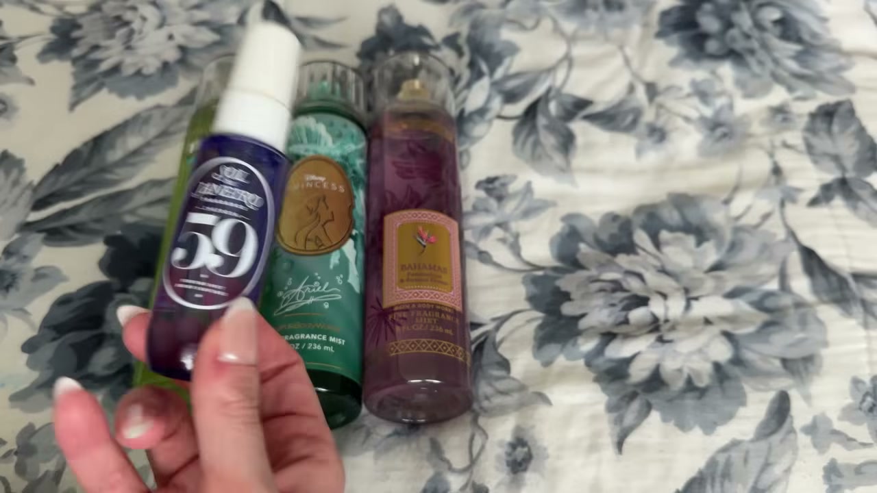 @laura.lavigne reviewing Bath & Body Works 59 Body Mist at 16:46 in a YouTube Shorts video