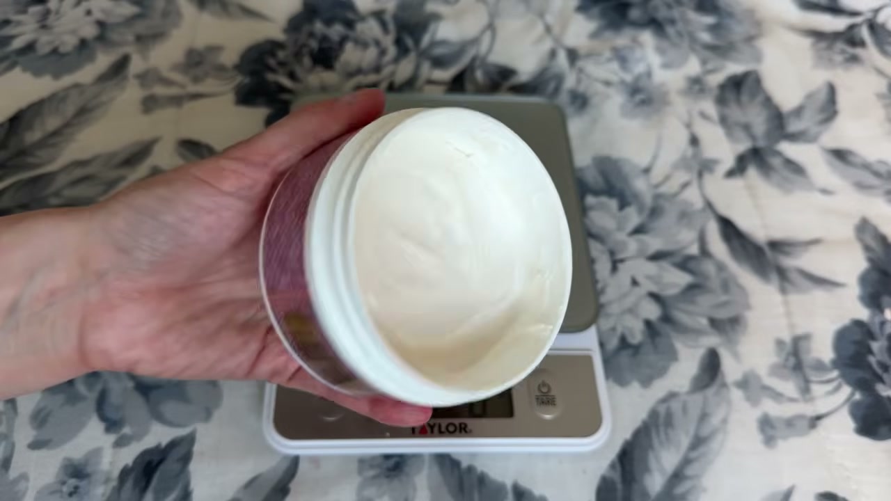 @laura.lavigne reviewing Bath & Body Works Bahamas Passion Fruit and Banana Flower Body Butter at 04:09 in a YouTube Shorts video