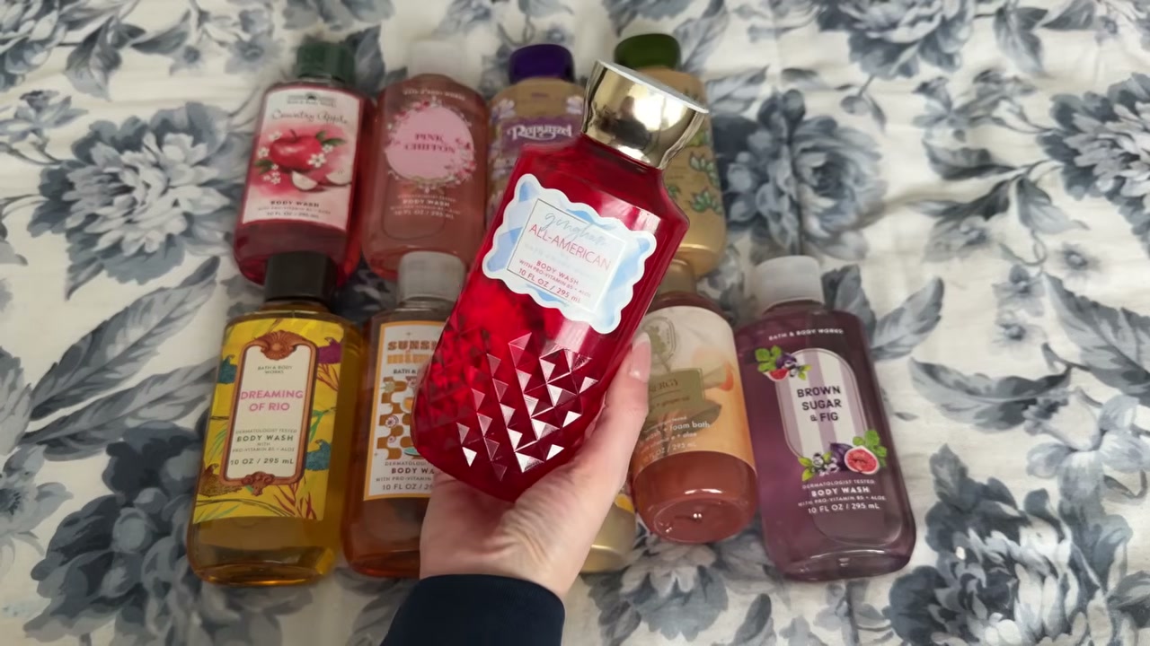 @laura.lavigne reviewing Bath & Body Works Country Apple Body Wash at 03:43 in a YouTube Shorts video