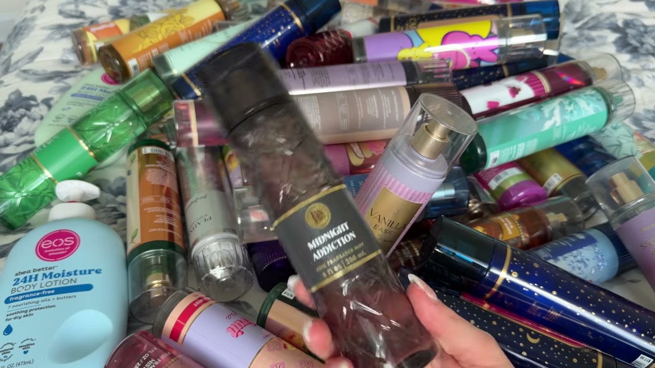 @laura.lavigne reviewing Bath & Body Works Midnight Addiction at 26:07 in a YouTube Shorts video
