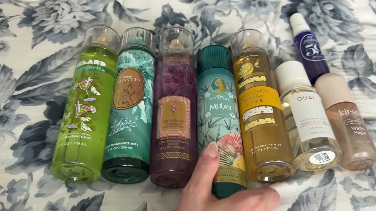 @laura.lavigne reviewing Bath & Body Works Mulan Body Mist at 15:15 in a YouTube Shorts video