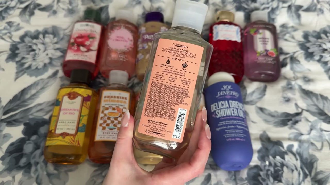 @laura.lavigne reviewing Bath & Body Works Pretty as a Peach Body Wash at 02:58 in a YouTube Shorts video
