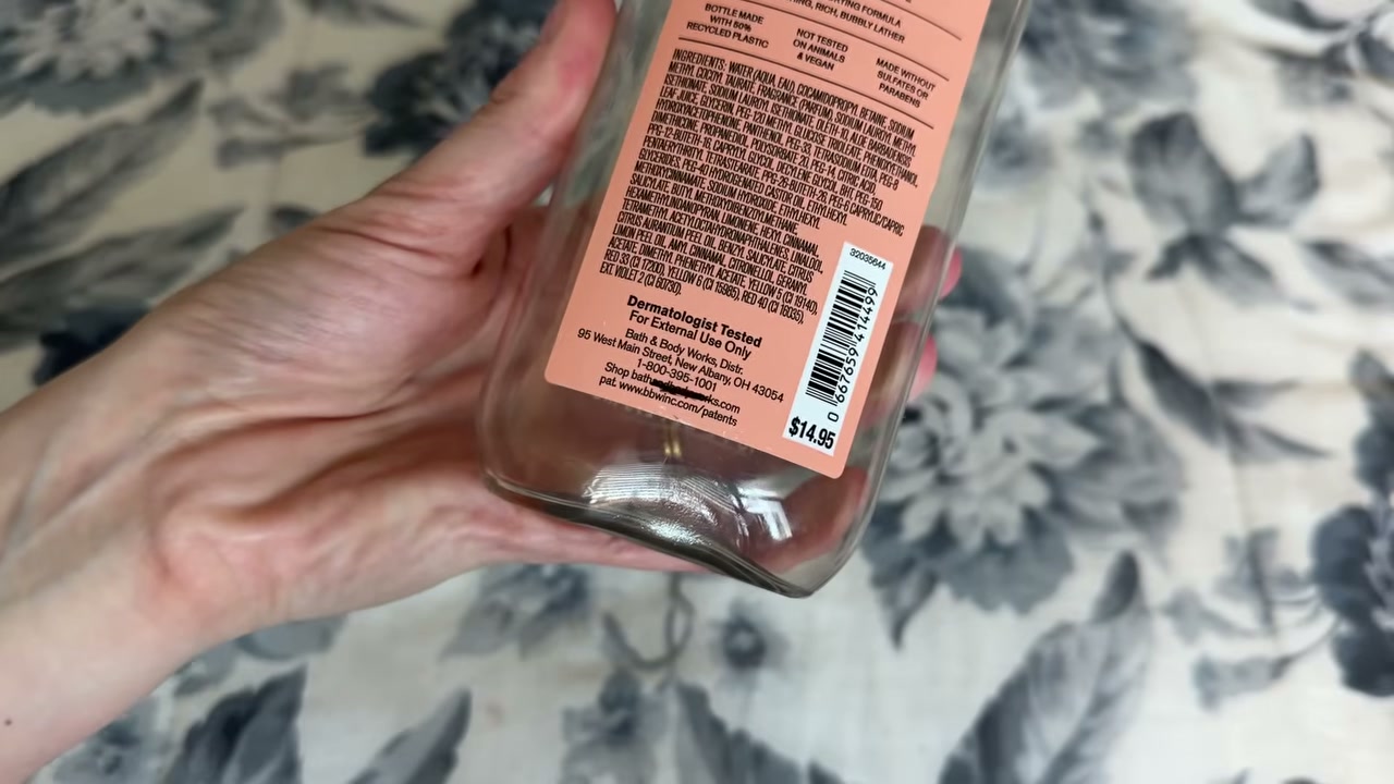 @laura.lavigne reviewing Bath & Body Works Pretty as a Peach Body Wash at 02:43 in a YouTube Shorts video