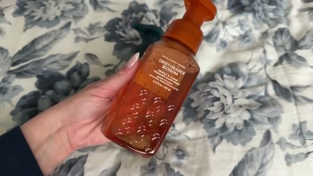@laura.lavigne reviewing Bath & Body Works Sweet Orange Blossom Hand Soap at 12:22 in a YouTube Shorts video