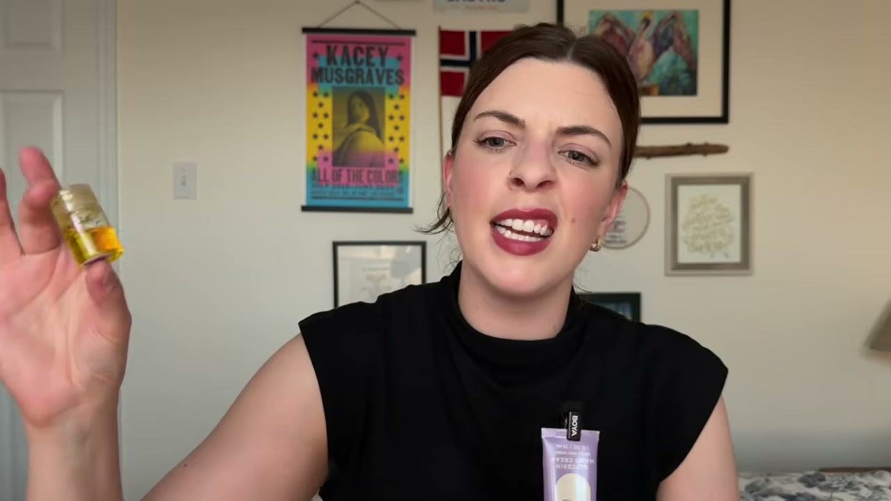 @laura.lavigne reviewing Olaplex Hair Oil at 18:41 in a YouTube Shorts video