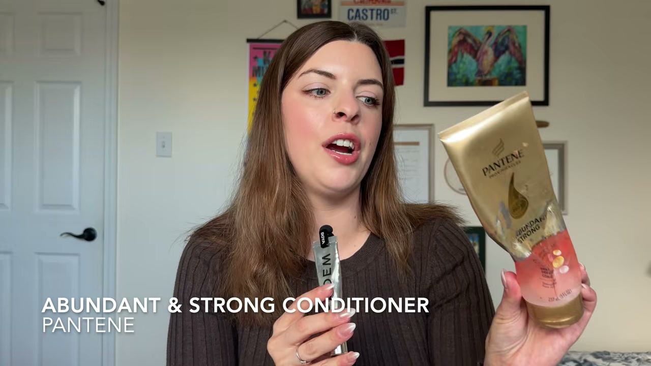@laura.lavigne reviewing Pantene Abundant and Strong Conditioner at 00:27 in a YouTube Shorts video