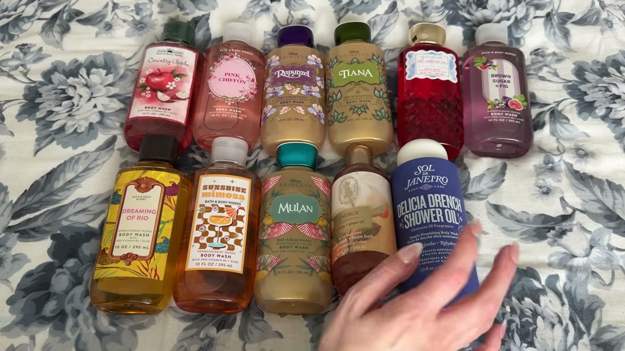 @laura.lavigne reviewing Sol de Janeiro Delicia Drench Shower Oil at 03:12 in a YouTube Shorts video