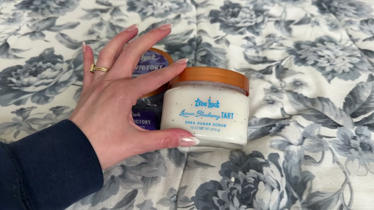 @laura.lavigne reviewing Tree Hut Lemon Blueberry Tart Scrub at 01:31 in a YouTube Shorts video