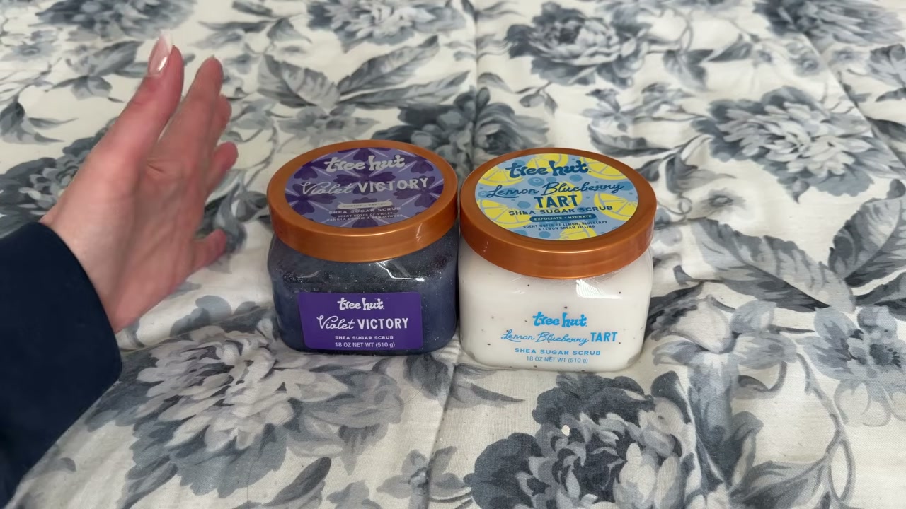 @laura.lavigne reviewing Tree Hut Violet Victory Scrub at 01:47 in a YouTube Shorts video