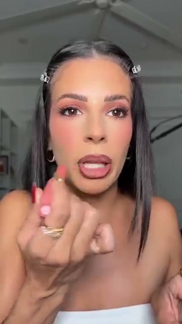 @laura88lee reviewing CoverGirl Clean Fresh Yummy Blur at 02:06 in a YouTube Shorts video