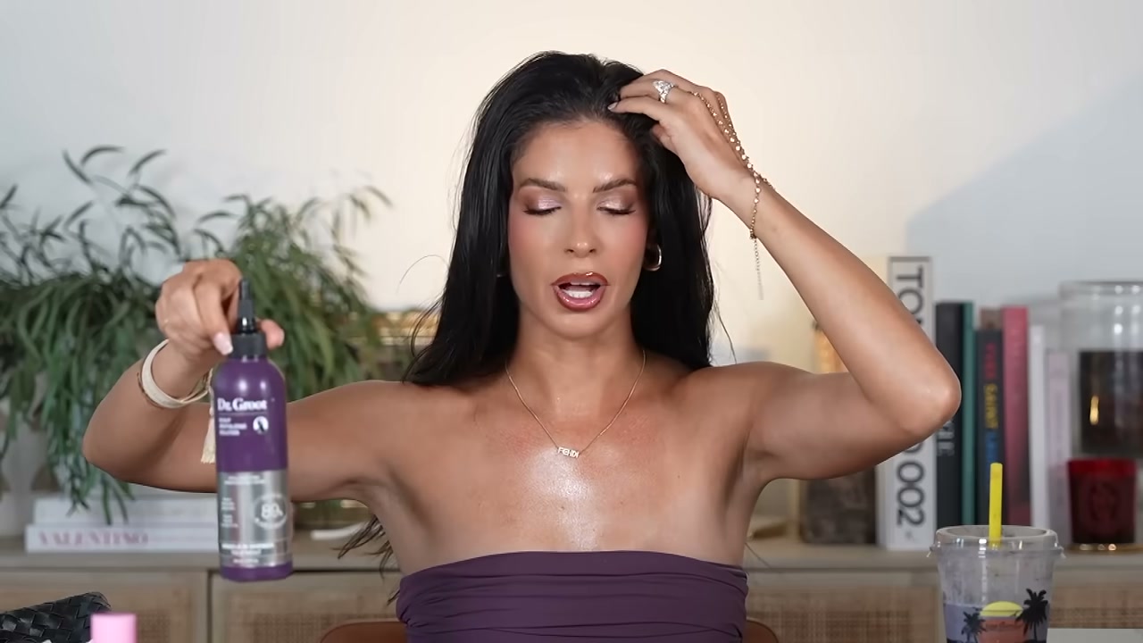 @laura88lee reviewing Dr. Groot Scalp Revitalization Solution at 23:37 in a YouTube Shorts video