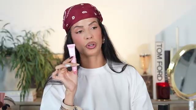 @laura88lee reviewing e.l.f. Cosmetics Melting Lip Balm at 19:44 in a YouTube Shorts video