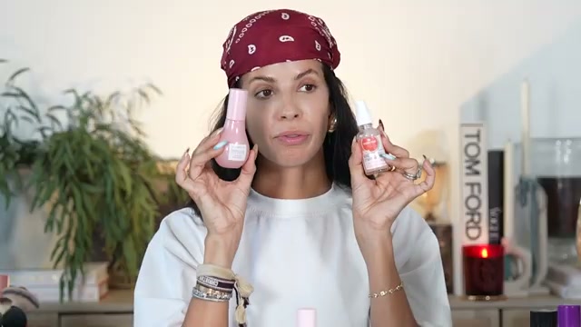 @laura88lee reviewing Essence Hello Good Stuff Glow Serum Primer at 00:50 in a YouTube Shorts video
