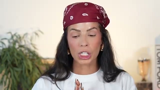 @laura88lee reviewing Makeup Revolution Eyeshadow Palette at 15:22 in a YouTube Shorts video