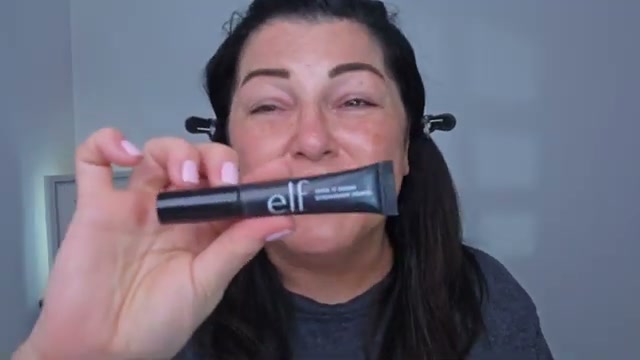 @laurafagelman reviewing e.l.f. Cosmetics Lock It Down Eyeshadow Primer at 02:41 in a YouTube Shorts video